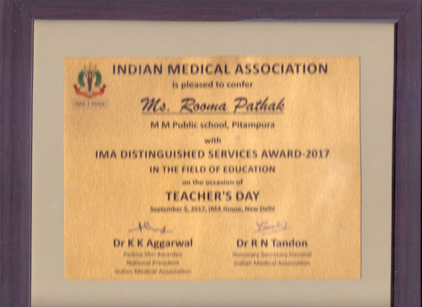 Felicitation of Principal Madam Mrs. Rooma Pathak with Distinguished Award