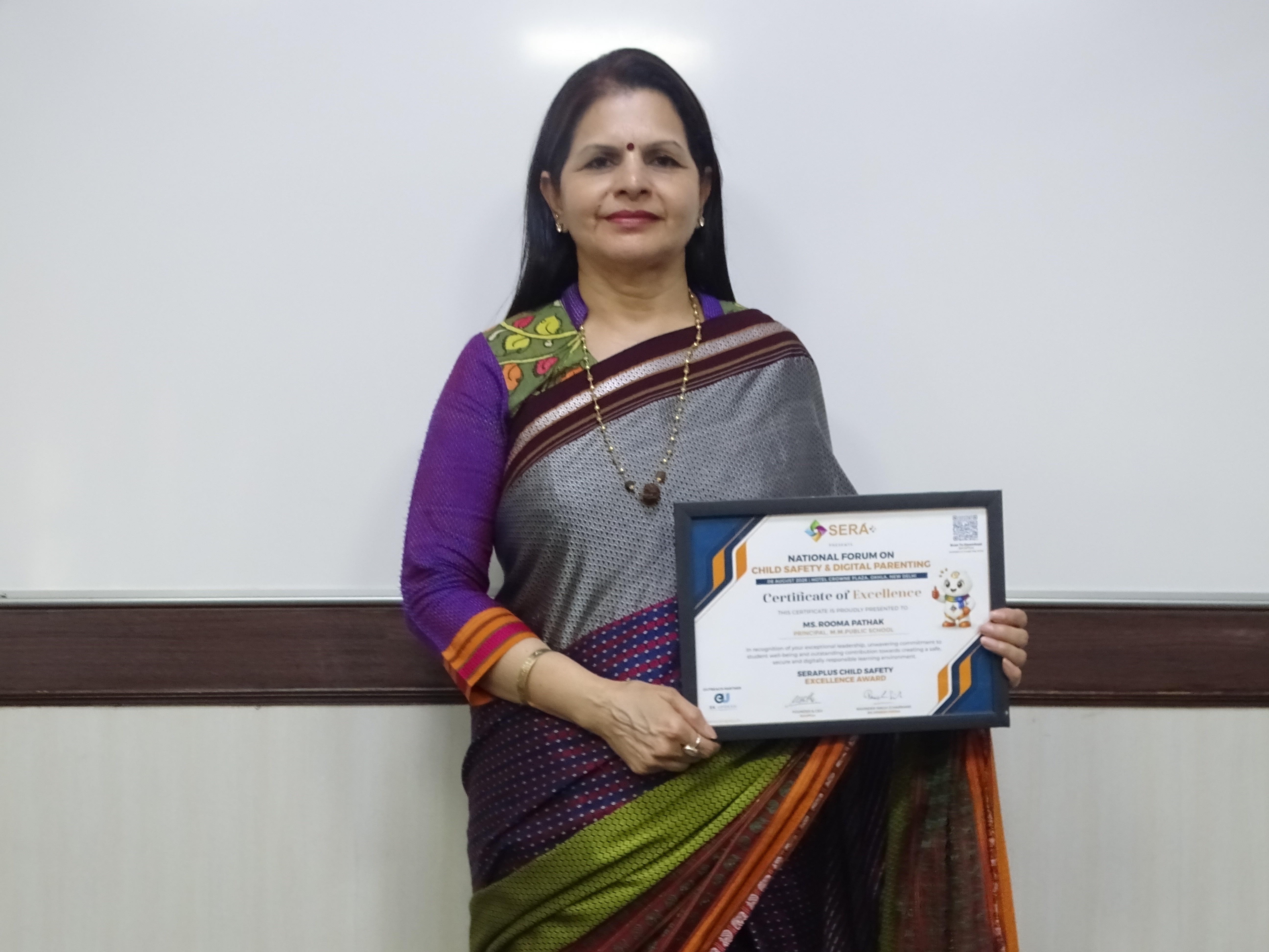 Hon’ble Principal Mrs. Rooma Pathak Felicitated with the SeraPlus Child Safety Excellence Award