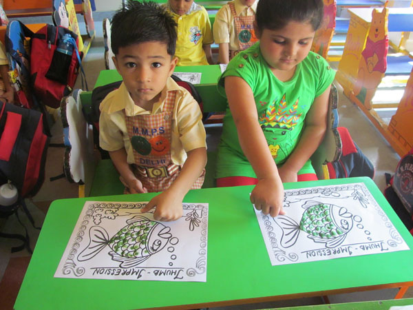 Thumb Printing Activity for LKG and UKG class on 07-04-2015