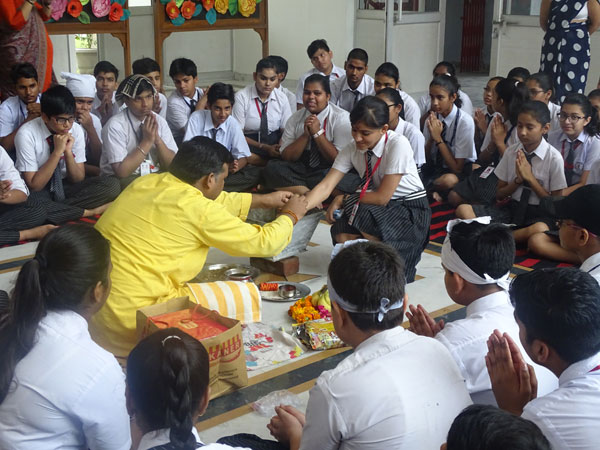 Atmosphere of Spirituality by Hawan of class IX